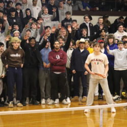 A group of Don Bosco Students cheering at a pickleball game