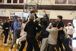 A group of Don Bosco Students cheered and jumped because their team one.